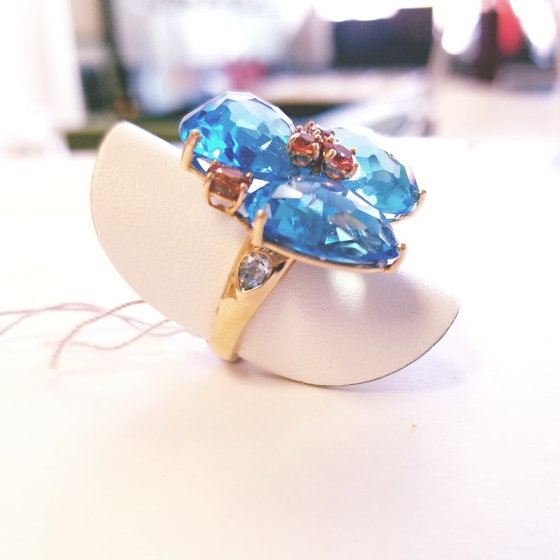 18K Rose Gold Petal Flower Ring with Genuine Blue Topaz and Red Sapphires