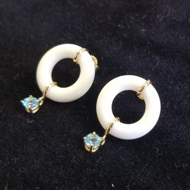 Bondeye Jewelry 14K Yellow Gold White Onyx Circular Earrings With Blue Topaz