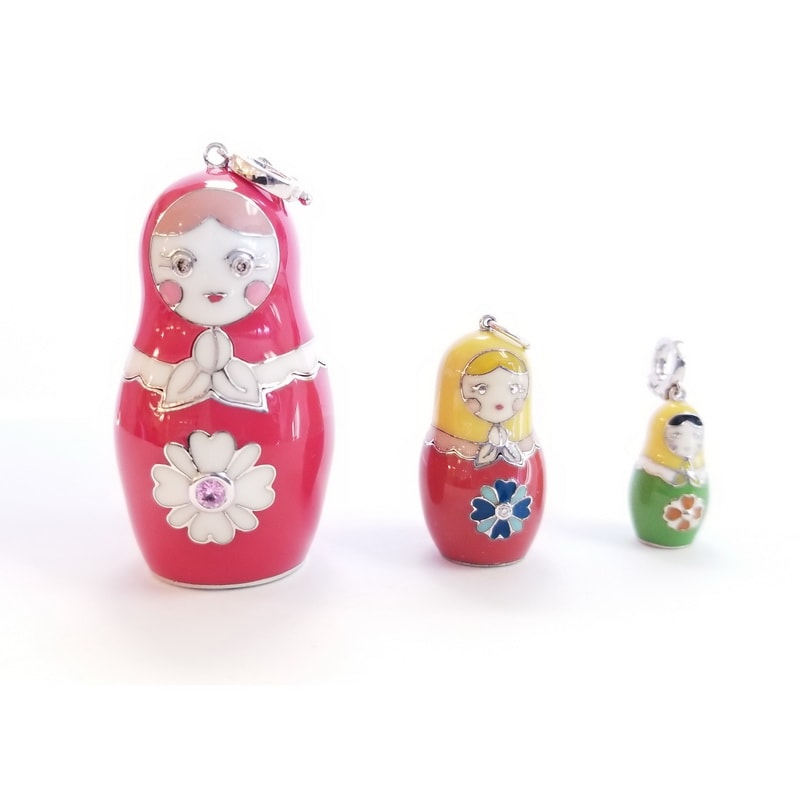 Red Enamel Covered Sterling Silver Russian Doll with Central Pink Sapphire